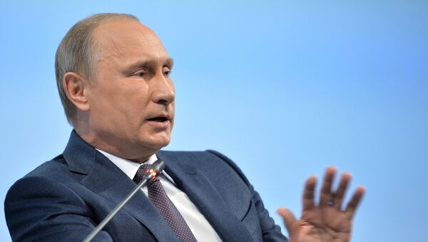 June 19, 2015. Russian President Vladimir Putin at a panel discussion during the plenary meeting of the 19th St. Petersburg International Economic Forum 2015. - Sputnik International