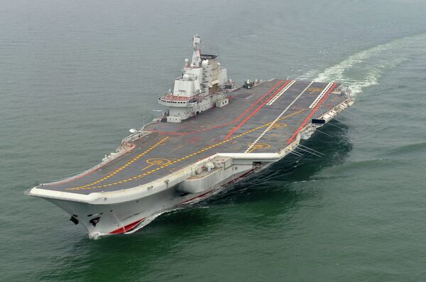 Chinese aircraft carrier Liaoning cruises for a test in the sea (File photo) Chinese aircraft carrier Liaoning cruises for a test in the sea (File photo) - Sputnik International