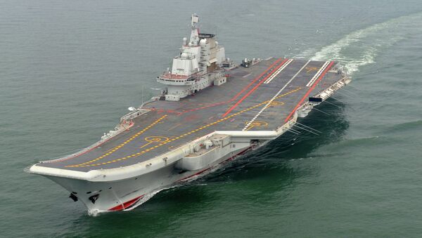 Chinese aircraft carrier Liaoning cruises for a test in the sea. (File) - Sputnik International