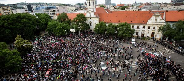 Participants gather during an anti-immigration rally organised by an initiative called Stop Islamisation of Europe and backed by the far-right People's Party-Our Slovakia in Bratislava, Slovakia Participants gather during an anti-immigration rally organised by an initiative called Stop Islamisation of Europe and backed by the far-right People's Party-Our Slovakia in Bratislava, Slovakia - Sputnik International