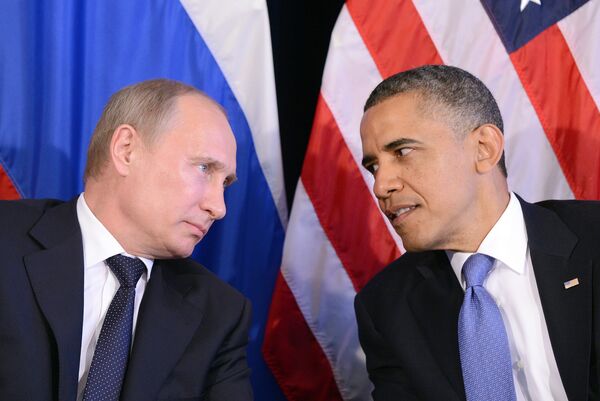 US President Barack Obama (R) listens to Russian President Vladimir Putin - Sputnik International