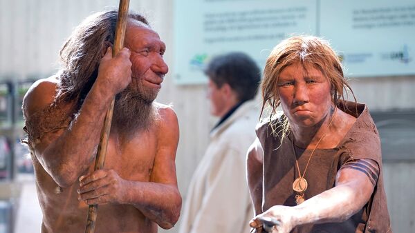 The prehistoric Neanderthal man N, left, is visited for the first time by another reconstruction of a homo neanderthalensis called Wilma, right, at the Neanderthal museum in Mettmann, Germany, Friday, March 20, 2009 - Sputnik International