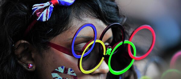 A spectator at the closing ceremony of the 30th Summer Olympic Games in London's Olympic Stadium. A spectator at the closing ceremony of the 30th Summer Olympic Games in London's Olympic Stadium. - Sputnik International