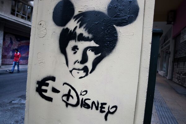 A man walks behind a stencil depicting German Chancellor Angela Merkel as a Disney character in Athens. Over the past five years of Greece’s economic depression, more and more paintings comment on the country’s financial and social woes. - Sputnik International