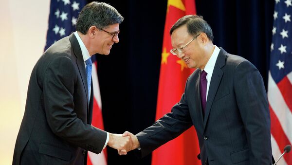 US Treasury Secretary Jack Lew shakes hands with China's State Councilor Yang Jiechi at the 7th US China Strategic and Economic Dialogue in Washington. - Sputnik International