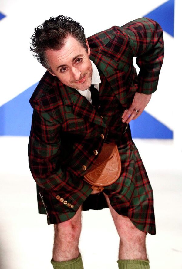 Actor Alan Cumming walks the runaway in the 8th annual Dressed To Kilt charity fashion show in New York, on Monday, 2010. - Sputnik International