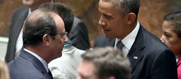 US President Barack Obama speaks with French President Francois Hollande at special meeting of the UN security council during the 69th Session of the UN General Assembly on September 24, 2014 in New York - Sputnik International