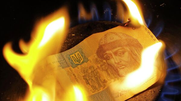 A burning one hryvnia bill - Sputnik International