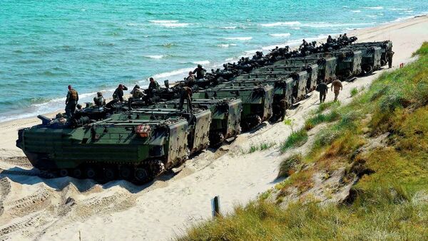 United States Marine Corps amphibious assault vehicles line up to return to their ship following an amphibious assault exercise during Baltic Operations (BALTOPS) 2015. - Sputnik International