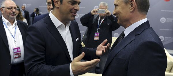 Greek Prime Minister Alexis Tsipras (L) speaks with Russian President Vladimir Putin during a session of the St. Petersburg International Economic Forum 2015 (SPIEF 2015) in St. Petersburg, Russia, June 19, 2015 Greek Prime Minister Alexis Tsipras (L) speaks with Russian President Vladimir Putin during a session of the St. Petersburg International Economic Forum 2015 (SPIEF 2015) in St. Petersburg, Russia, June 19, 2015 - Sputnik International