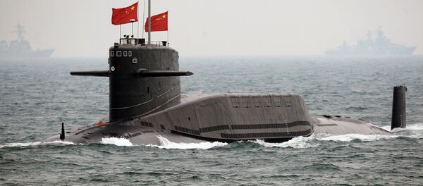 File photo, a Chinese Navy nuclear-powered submarine sails during an international fleet review to celebrate the 60th anniversary of the founding of People's Liberation Army Navy File photo, a Chinese Navy nuclear-powered submarine sails during an international fleet review to celebrate the 60th anniversary of the founding of People's Liberation Army Navy - Sputnik International