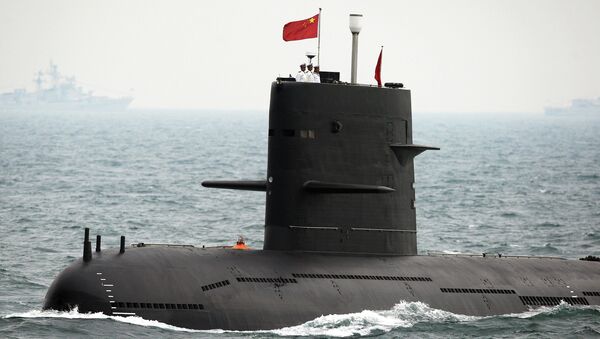 File photo, a Chinese Navy submarine attends an international fleet review to celebrate the 60th anniversary of the founding of the People's Liberation Army Navy on April 23, 2009 off Qingdao in Shandong Province - Sputnik International