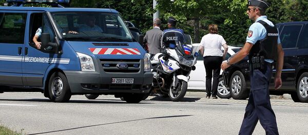 A French Gendarme blocks the access road to the Saint-Quentin-Fallavier industrial area, near Lyon, France, June 26, 2015 A French Gendarme blocks the access road to the Saint-Quentin-Fallavier industrial area, near Lyon, France, June 26, 2015 - Sputnik International