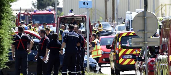 French police and firefighters gather at the entrance of the Air Products company in Saint-Quentin-Fallavier, near Lyon, central eastern France, on June 26, 2015 French police and firefighters gather at the entrance of the Air Products company in Saint-Quentin-Fallavier, near Lyon, central eastern France, on June 26, 2015 - Sputnik International