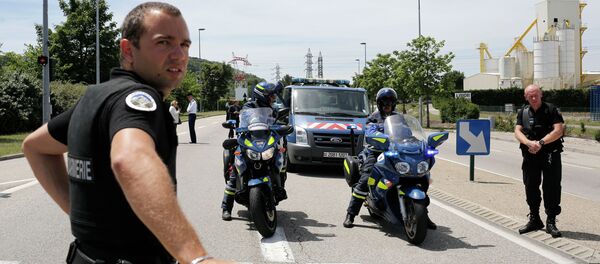Police officer block the area where an attack took place, Friday, June 26, 2015 in Saint-Quentin-Fallavier, southeast of Lyon, France Police officer block the area where an attack took place, Friday, June 26, 2015 in Saint-Quentin-Fallavier, southeast of Lyon, France - Sputnik International