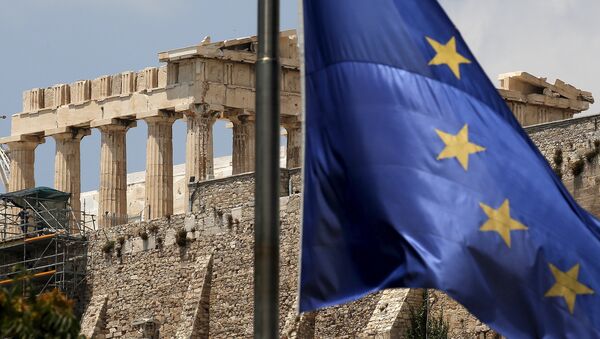 A European Union flag flutters before the temple of Parthenon at the Acropolis hill in Athens, Greece - Sputnik International
