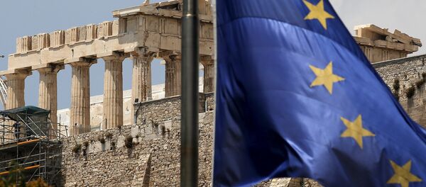 A European Union flag flutters before the temple of Parthenon at the Acropolis hill in Athens, Greece - Sputnik International