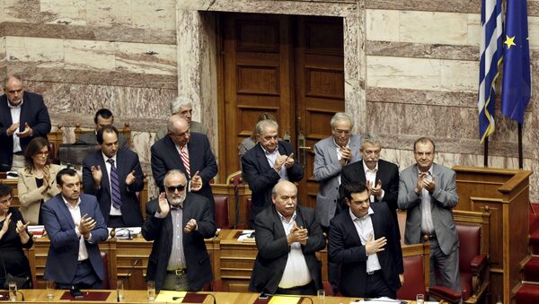 Greek Prime Minister Alexis Tsipras (bottom R) acknowledges applause during a parliamentary session in Athens, Greece June 28, 2015 - Sputnik International