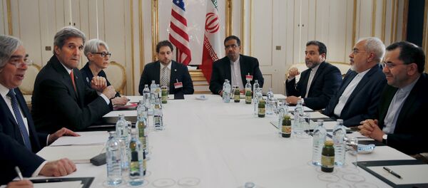 U.S. Secretary of Energy Ernest Moniz, U.S. Secretary of State John Kerry and U.S. Under Secretary for Political Affairs Wendy Sherman (L-3rd L) meet with Iranian Foreign Minister Mohammad Javad Zarif (2nd R) at a hotel in Vienna, Austria - Sputnik International