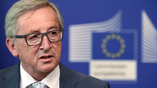 European Commission President Jean-Claude Juncker speaks during a joint press conference with NATO Secretary General after a meeting on June 16, 2015 at EU headquarters in Brussels. - Sputnik International