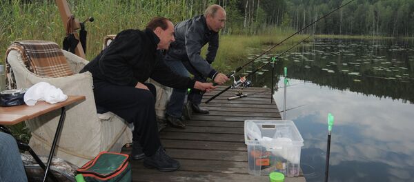 Russian President Vladimir Putin, right, and former Italian Premier Silvio Berlusconi Russian President Vladimir Putin, right, and former Italian Premier Silvio Berlusconi - Sputnik International
