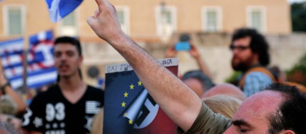 Thousand of demonstrators gather outside Greece's parliament to express their support for Prime Minister Alexis Tsipras' anti-austerity stance during negotiations over the country's debt. Thousand of demonstrators gather outside Greece's parliament to express their support for Prime Minister Alexis Tsipras' anti-austerity stance during negotiations over the country's debt. - Sputnik International