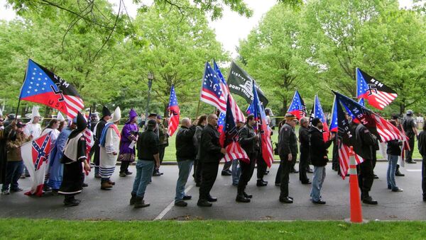 Members of the National Socialists Movement and the White Knights of the Klu Klux Klan begin a march to the Capitol in Frankfort, Ky - Sputnik International