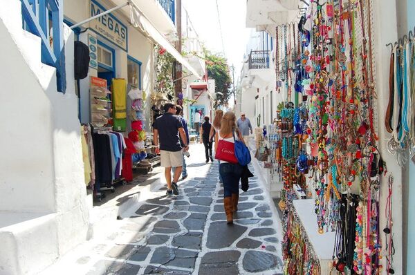 Tourists walking in the streets of Mykonos town, Greece. Tourists walking in the streets of Mykonos town, Greece. - Sputnik International