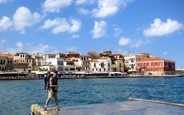 A tourist and his son in Chania, Crete. A tourist and his son in Chania, Crete. - Sputnik International