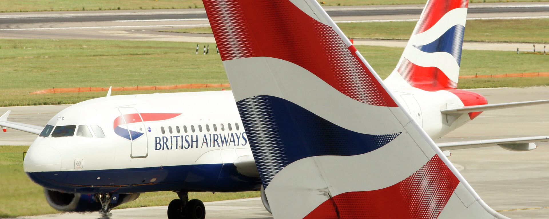 British Airways airplanes are seen at Heathrow Airport in London. - Sputnik International, 1920, 22.07.2022