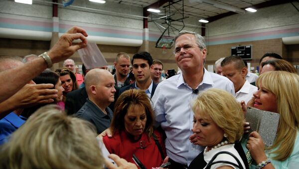 Republican presidential candidate, former Florida Gov. Jeb Bush reacts while meeting people after speaking at a campaign event Saturday, June 27, 2015, in Henderson, Nev. - Sputnik International