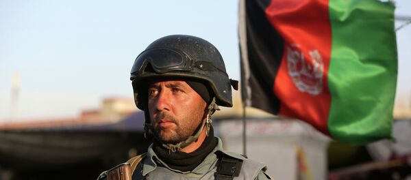 Afghan security forces inspect the site after a suicide car bombing attack in Kabul, Afghanistan, Tuesday, May 19, 2015. Afghan security forces inspect the site after a suicide car bombing attack in Kabul, Afghanistan, Tuesday, May 19, 2015. - Sputnik International