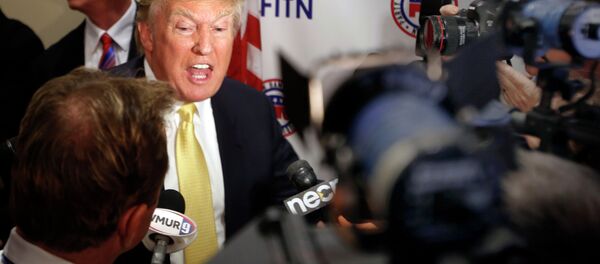 Donald Trump speaks to reporters after addressing at the Republican Leadership Summit Saturday, April 18, 2015, in Nashua, N.H. Donald Trump speaks to reporters after addressing at the Republican Leadership Summit Saturday, April 18, 2015, in Nashua, N.H. - Sputnik International
