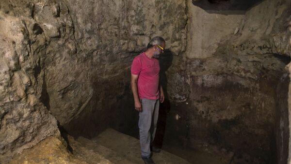 Ein Karem resident, Tal, stands in a ritual bath that was discovered under his family's house in Jerusalem, July 1, 2015 - Sputnik International