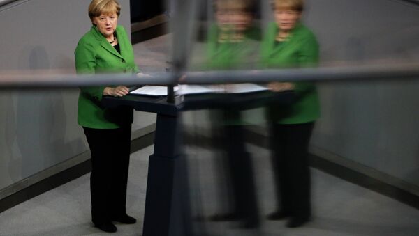 German Chancellor Angela Merkel delivers her speech at the German parliament Bundestag in Berlin. - Sputnik International