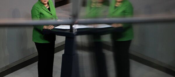 German Chancellor Angela Merkel delivers her speech at the German parliament Bundestag in Berlin. - Sputnik International