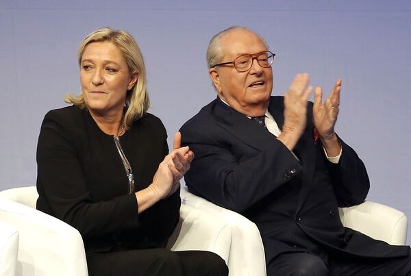 French far-right Front National leader Marine Le Pen and her father Jean-Marie Le Pen in Lyon, central France. French far-right Front National leader Marine Le Pen and her father Jean-Marie Le Pen in Lyon, central France. - Sputnik International