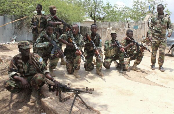 Somali government soldiers pose after they captured Belidogle airport, Somalia, with some help from African Union troops, in 2012. Somali government soldiers pose after they captured Belidogle airport, Somalia, with some help from African Union troops, in 2012. - Sputnik International