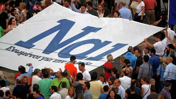 The word 'Yes' in Greek is seen on a banner during a pro-Euro rally in front of the parliament building, in Athens, Greece, June 30, 2015 - Sputnik International