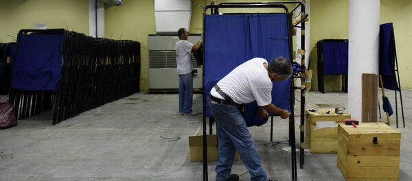 Municipality workers prepare the equipment for the upcoming referendum at a warehouse in the northern Greek port city of Thessaloniki, Wednesday, July 1, 2015 Municipality workers prepare the equipment for the upcoming referendum at a warehouse in the northern Greek port city of Thessaloniki, Wednesday, July 1, 2015 - Sputnik International