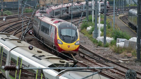 A Virgin train arrives at Euston station in London, on August 15, 2012 - Sputnik International