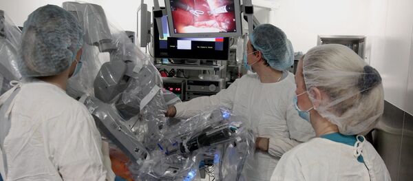 Doctors operate the Da Vinci Surgical System at the Medical Center of the Far Eastern Federal University on Russky Island in Vladivostok. Doctors operate the Da Vinci Surgical System at the Medical Center of the Far Eastern Federal University on Russky Island in Vladivostok. - Sputnik International