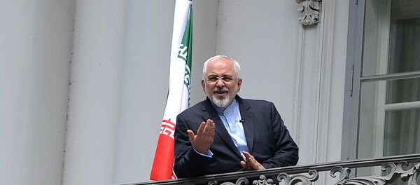 Iranian Foreign Minister Javad Zarif talks to media from bacon of the Palais Coburg Hotel, venue of the nuclear talks in Vienna, Austria on July 2, 2015 Iranian Foreign Minister Javad Zarif talks to media from bacon of the Palais Coburg Hotel, venue of the nuclear talks in Vienna, Austria on July 2, 2015 - Sputnik International