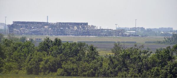 A view from the positions of the Ukrainian armed forces shows the local airport outside Donetsk, Ukraine - Sputnik International