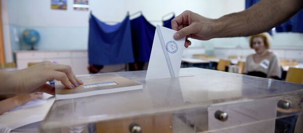 A man casts his vote at a polling station in the northern Greek port city of Thessaloniki, Sunday, July 5, 2015 A man casts his vote at a polling station in the northern Greek port city of Thessaloniki, Sunday, July 5, 2015 - Sputnik International