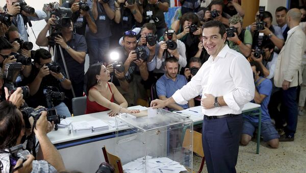 Greek Prime Minister Alexis Tsipras votes at a polling station in Athens, Greece July 5, 2015 - Sputnik International