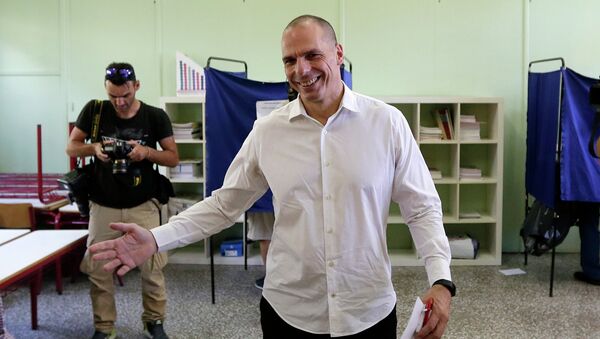 Greece's Finance Minister Yanis Varoufakis casts his vote at a polling station in Athens, Sunday, July 5, 2015 - Sputnik International