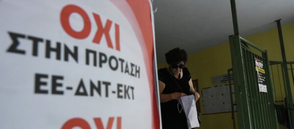 An elderly woman leaves from a polling station as the poster reading ''No to the proposal of EU-IMF-ECB'' in the northern Greek port city of Thessaloniki, Sunday, July 5, 2015 An elderly woman leaves from a polling station as the poster reading ''No to the proposal of EU-IMF-ECB'' in the northern Greek port city of Thessaloniki, Sunday, July 5, 2015 - Sputnik International