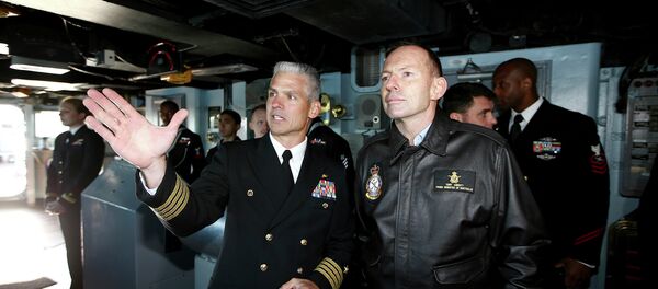 Australian Prime Minister Tony Abbott, right, speaks to Captain Kyle P. Higgins onboard the USS Blue Ridge as she arrives in Sydney Harbour, Australia, Friday, July 3, 2015 Australian Prime Minister Tony Abbott, right, speaks to Captain Kyle P. Higgins onboard the USS Blue Ridge as she arrives in Sydney Harbour, Australia, Friday, July 3, 2015 - Sputnik International