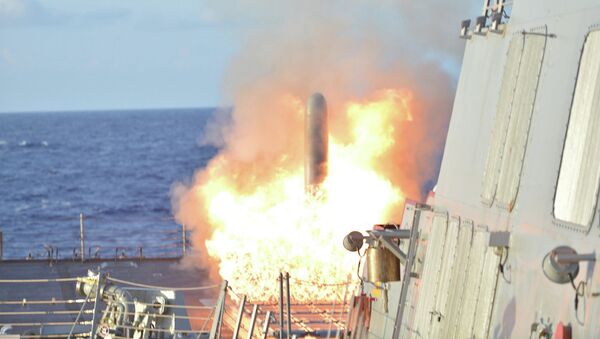 A file photo showing a Tomahawk Land Attack Missile launches from Arleigh Burke-Class guided-missile destroyer USS Lassern (DDG 82) during Multi-Sail 2015 - Sputnik International